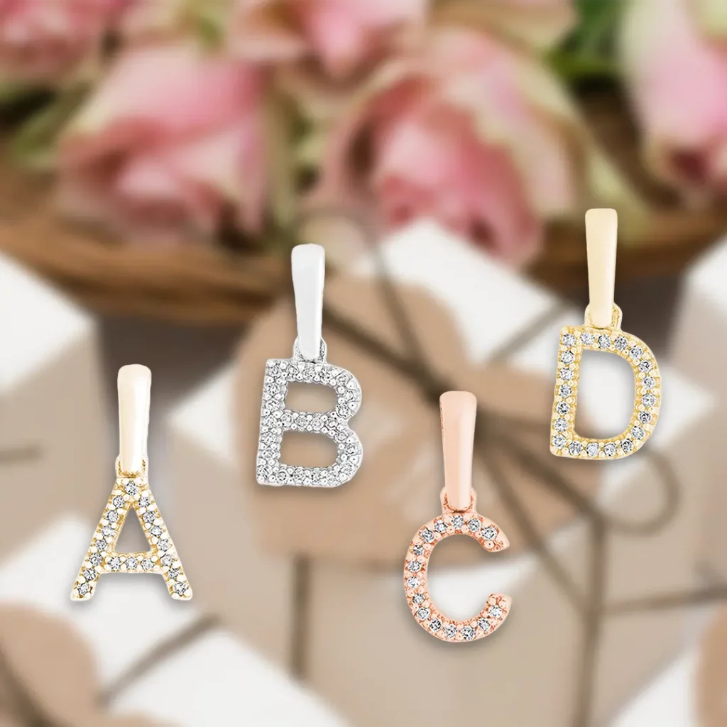 Goldanhänger Buchstaben Anhänger mit Diamanten für Halsketten und Bettelarmbänder Juwelier Brandstetter